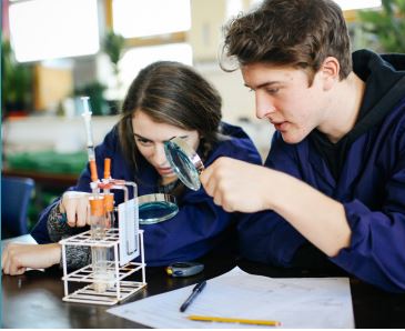 Applied Science Students With Magnifying Glasses