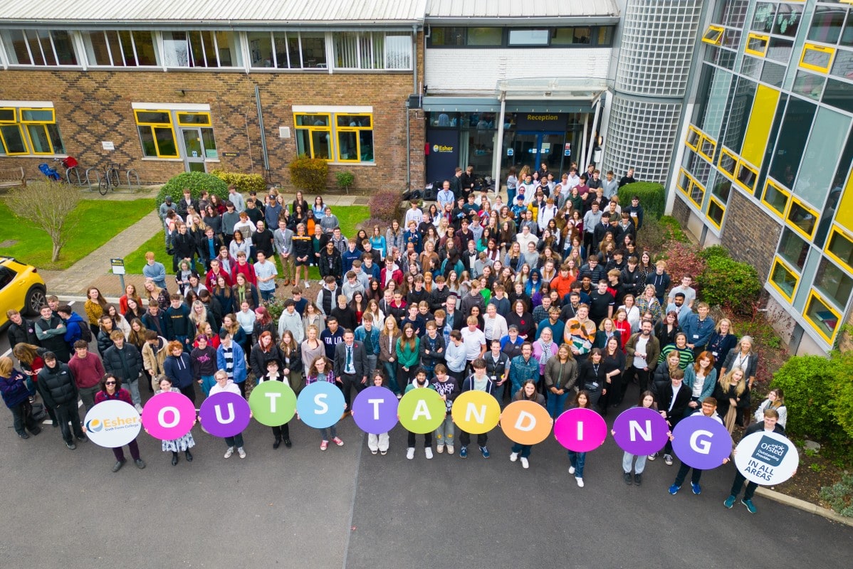 Students holding Ofsted boards up