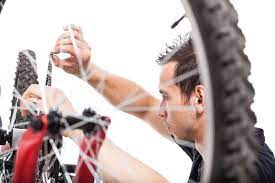 Man repairing bike