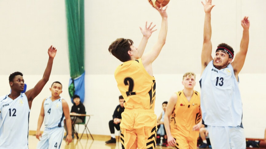 Men Playing Basketball