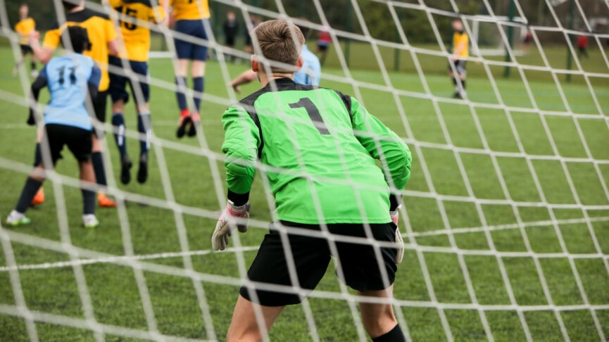 Man in football goal