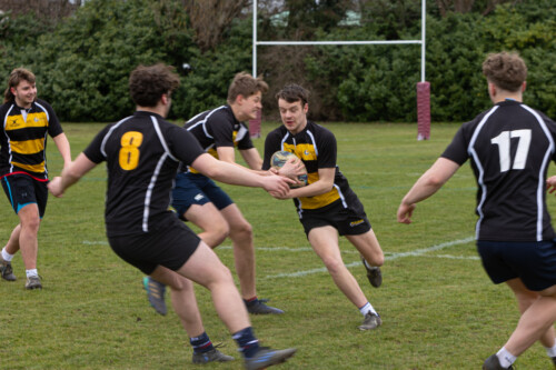 Men playing rugby